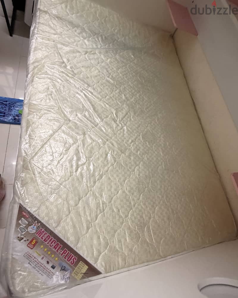 Study table, cupboard, medical plus unopened mattresses 2