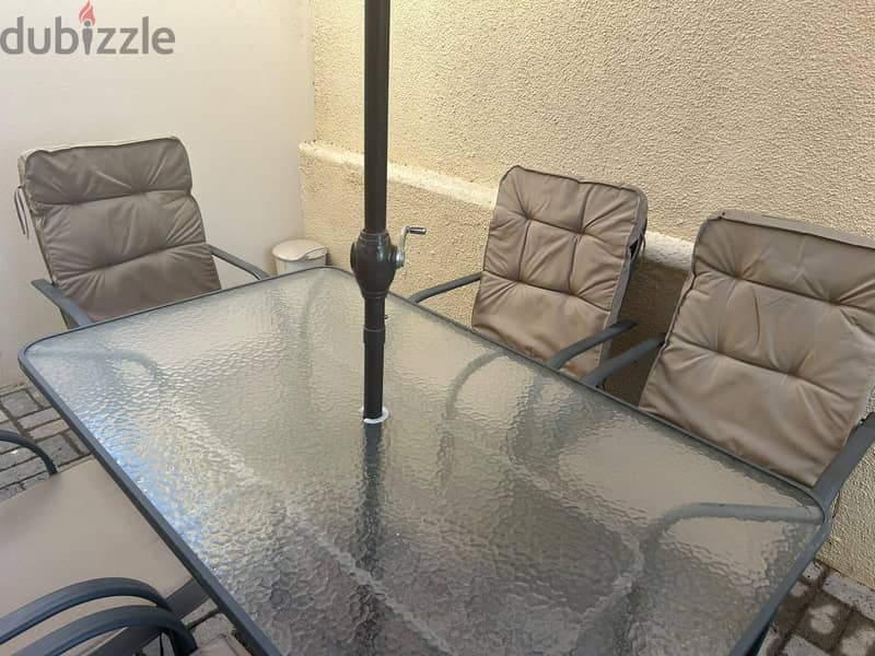 Table set with umbrella and 6 chairs 4