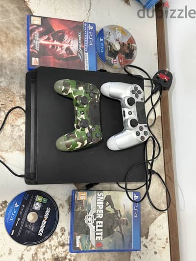 Ps4 slim for sale 500gb with 2 controller with 4 games cds