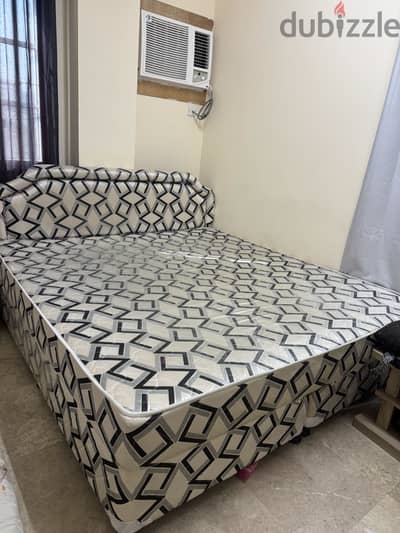 King bed with coat