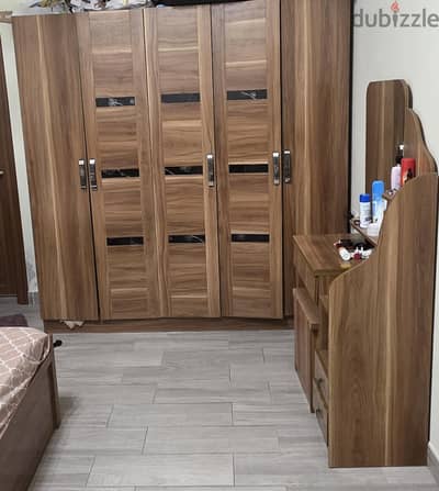 bedroom set with wardrobe and dressing table