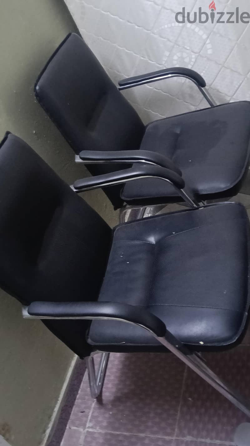 office table with revolving chair and two other chairs 1