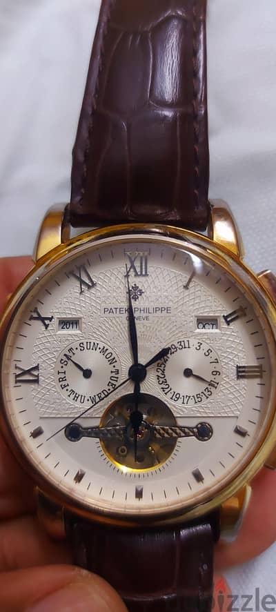 patek philippe  automatic . swiss made