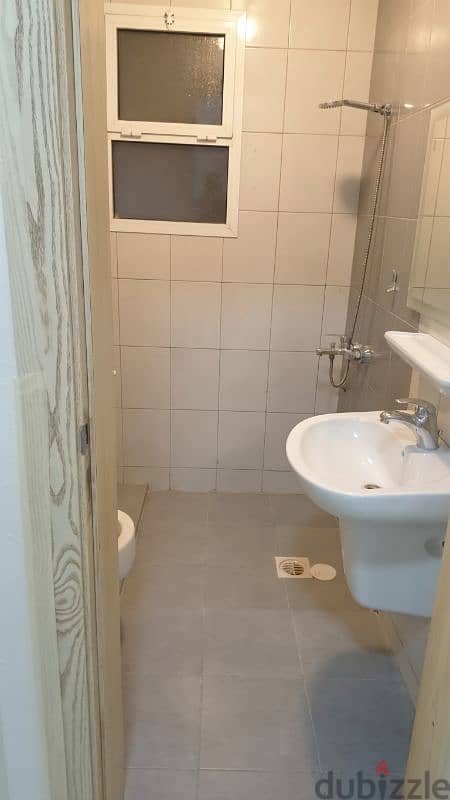 Room with a bathroom, including water, electricity, and internet. 1