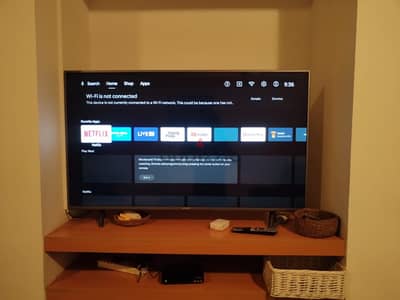 tv. bed with mattress. chair.