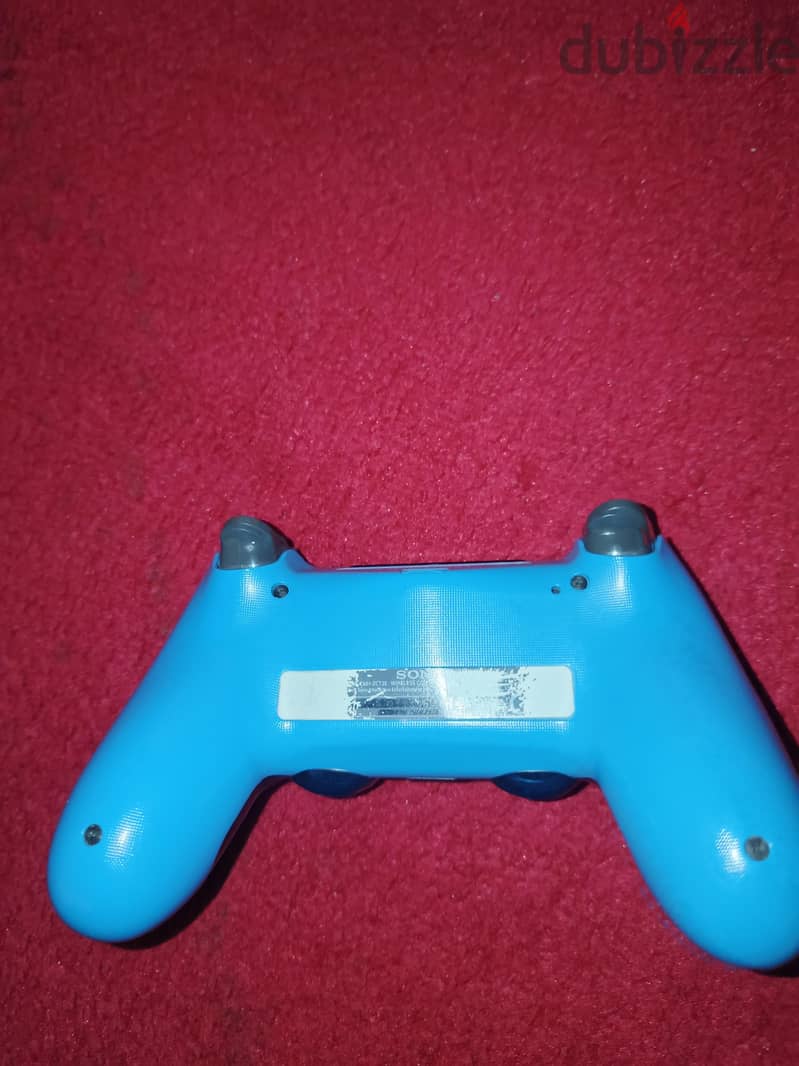 used ps4 10/10 condition +5 games 9