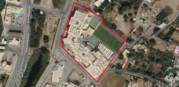 للبيع | أرض تجارية مع مدرسة  For Sale Commercial Land
