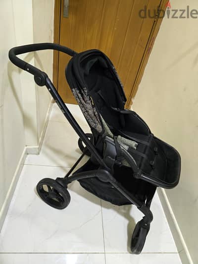 Neat and Clean Giggles Stroller and Car seat like new