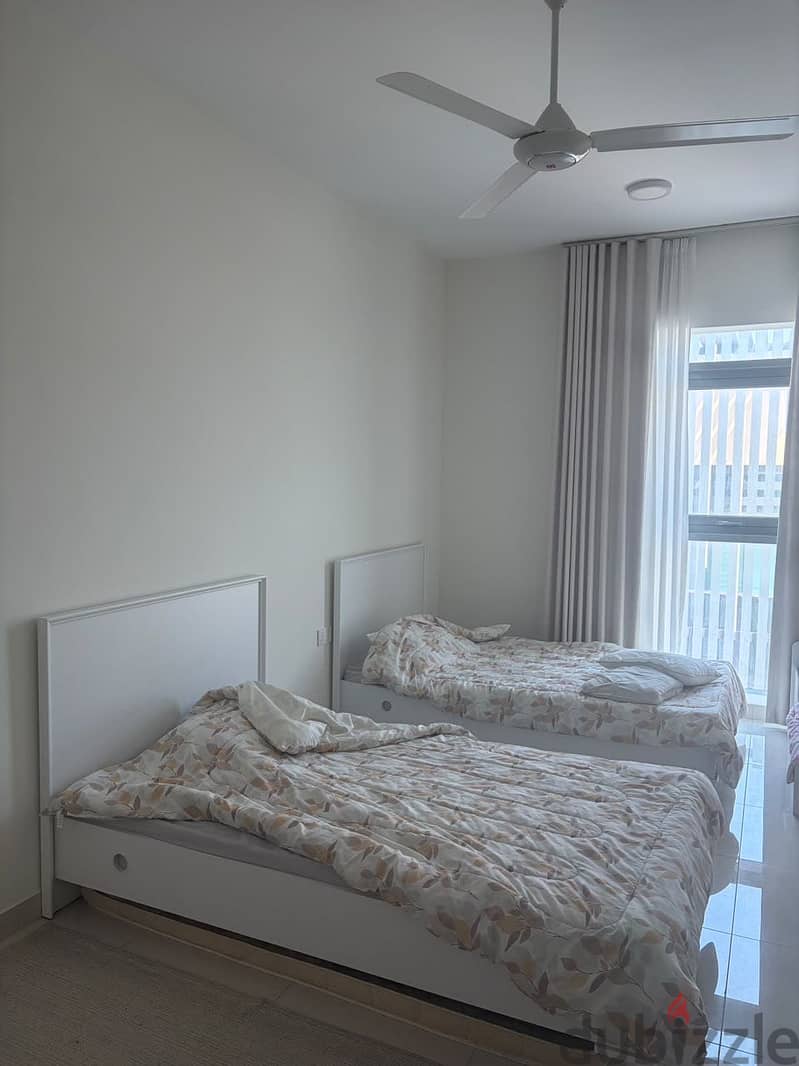 Two beds with wardrobe 1