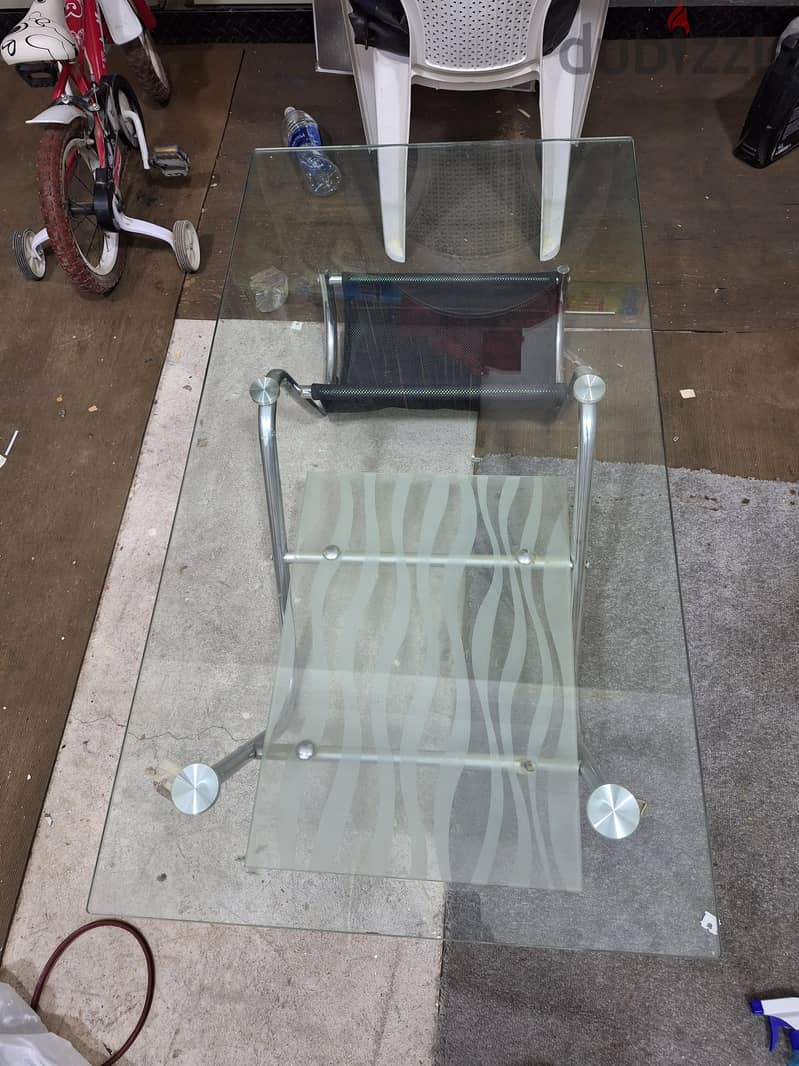 glass table for sale. Height 120 cm length 65 cm 1