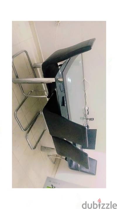 Black Glass Dinning table with 6 chairs