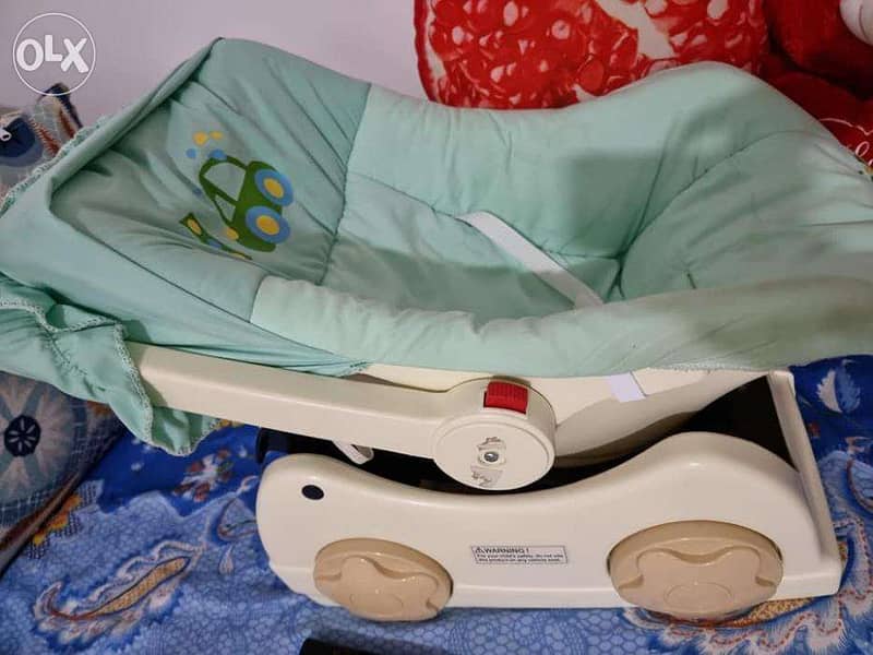 baby trolly - swing , lock- excellent condition - 2 months used 0