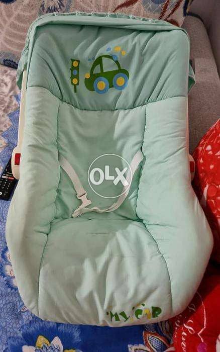 baby swing and lock troly - only 2 months used 1