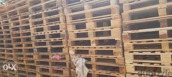 Used wooden and plastic pallets