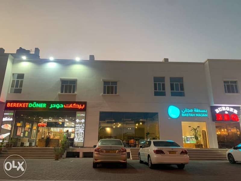 Shops in Al Khoudh main Street next to high brand cafes and restaurant 1