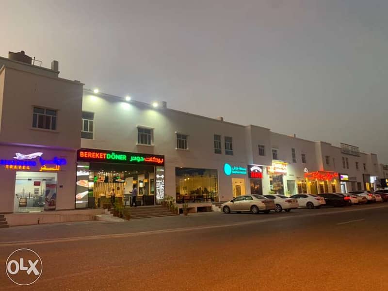 Shops in Al Khoudh main Street next to high brand cafes and restaurant 2