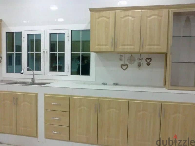 kitchen cabinets with aluminium, glass and glidding sheet 7