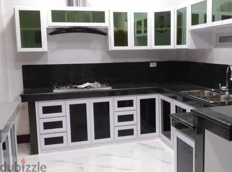 kitchen cabinets with aluminium, glass and glidding sheet 10