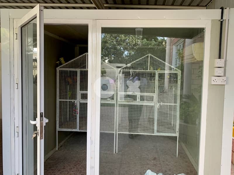 Air conditioned Aviary with birds and two cages for sale 0