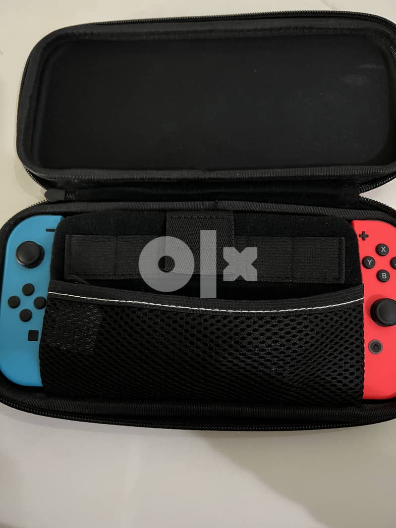 Nintendo switch. With red/blue joy con (2019 edition) 6