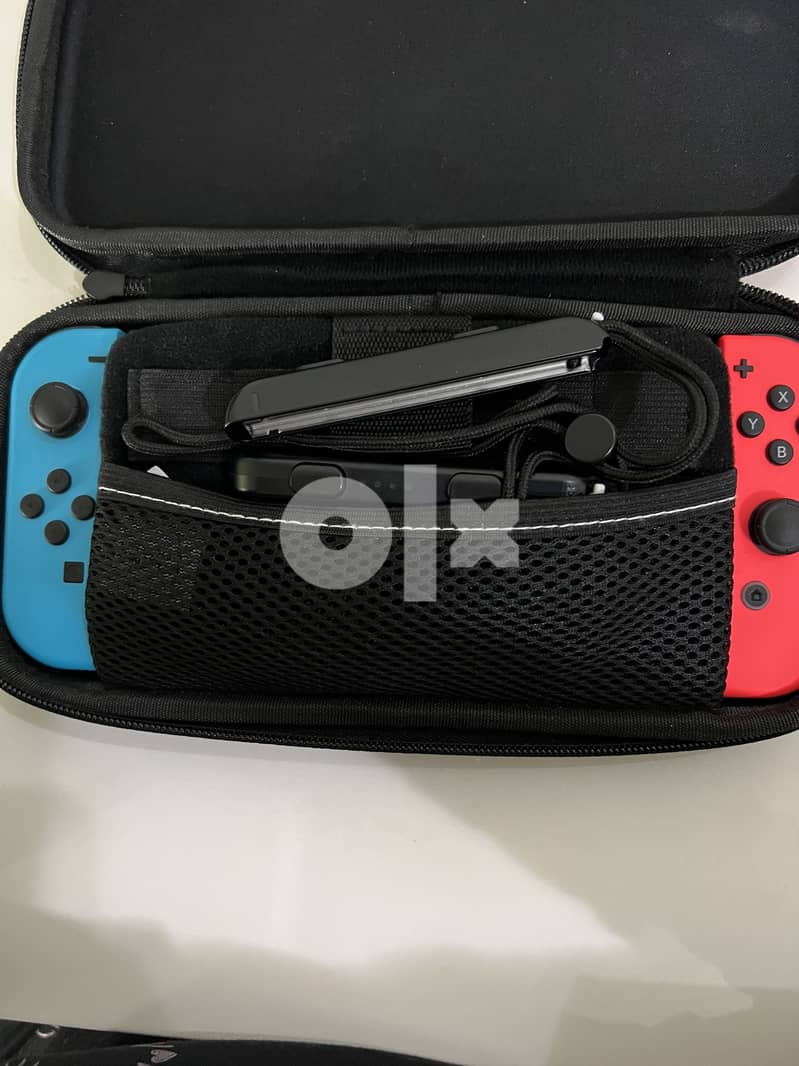 Nintendo switch. With red/blue joy con (2019 edition) 7