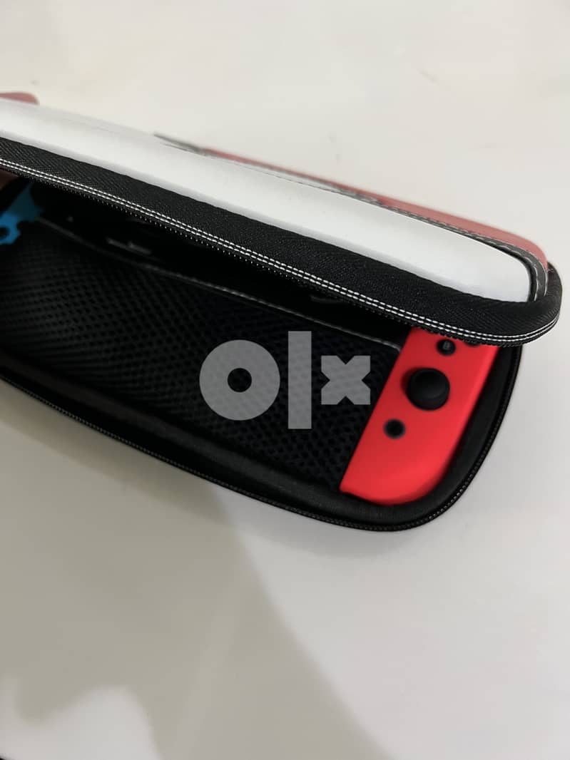 Nintendo switch. With red/blue joy con (2019 edition) 8