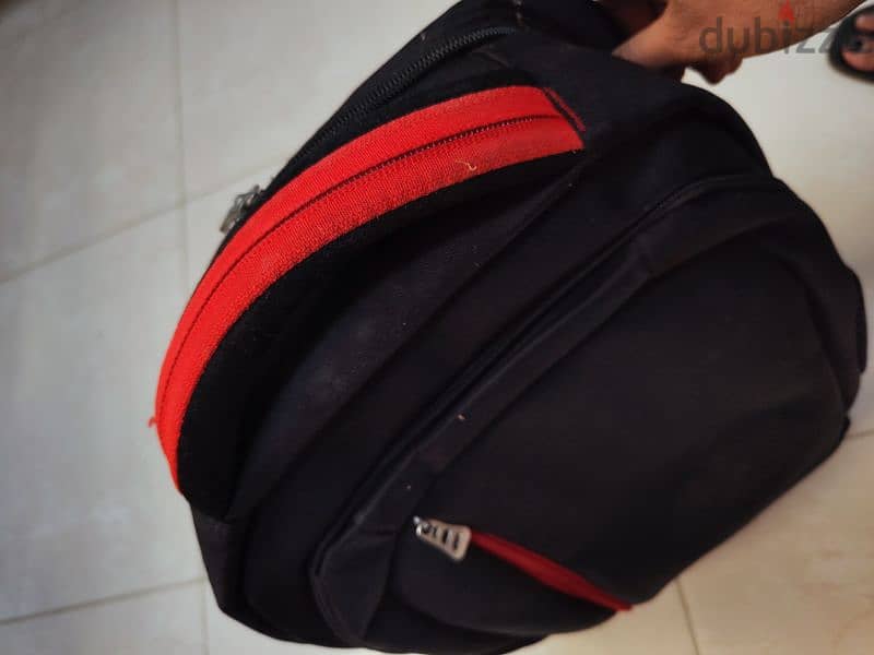 Black and red bag . 1
